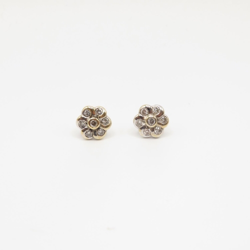 30 - Pair of 9ct gold and diamond flower earrings  1.2g