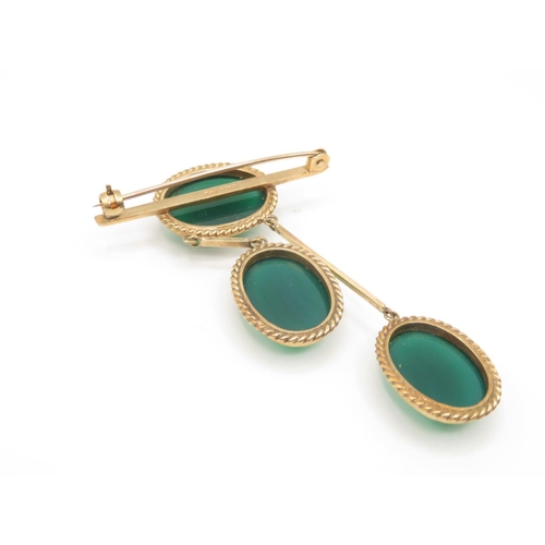 37 - Green stone and 9ct gold brooch with hanging pendants attached 12.6g 63mm