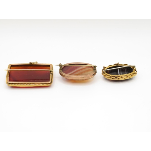 48 - 3x 9ct gold and agate insert brooches total weight 34.5g