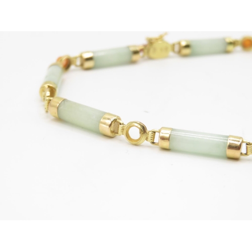 56 - 14ct gold and jadeite bracelet 20cm long  7.6g