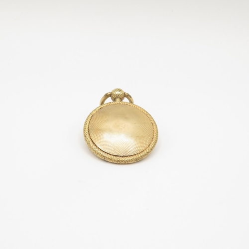 67 - 9ct gold locket containing plaited hair with spring opening catch 30mm diameter  9g