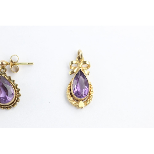 102 - 2 x 9ct gold paired amethyst earrings and pendants (3.8g)