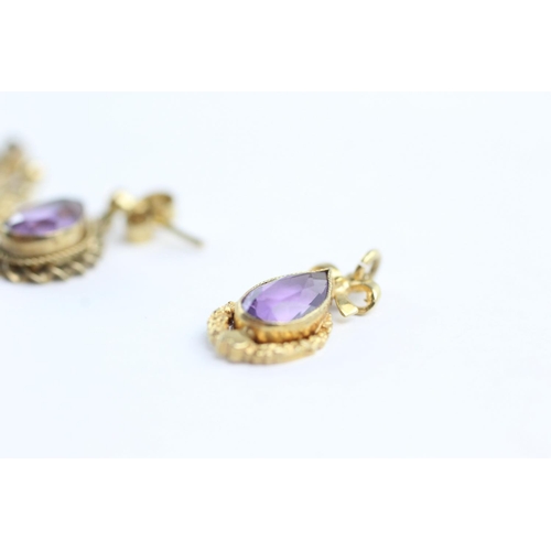 102 - 2 x 9ct gold paired amethyst earrings and pendants (3.8g)