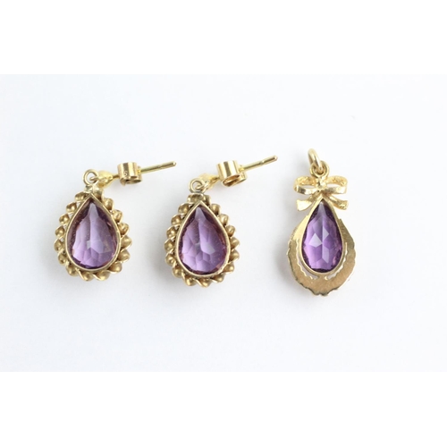 102 - 2 x 9ct gold paired amethyst earrings and pendants (3.8g)