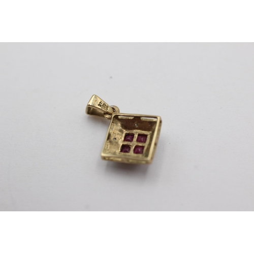 118 - 9ct gold ruby & diamond framed pendant (1.3g)