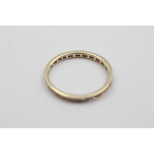 126 - 9ct gold diamond eternity ring (1.2g) Size R