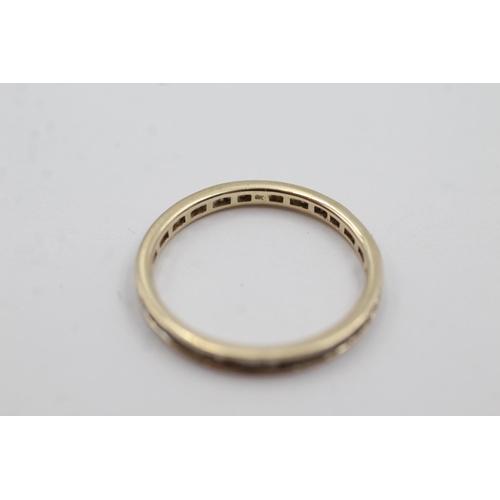 126 - 9ct gold diamond eternity ring (1.2g) Size R