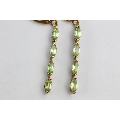 128 - 9ct gold peridot drop earrings (2.2g)