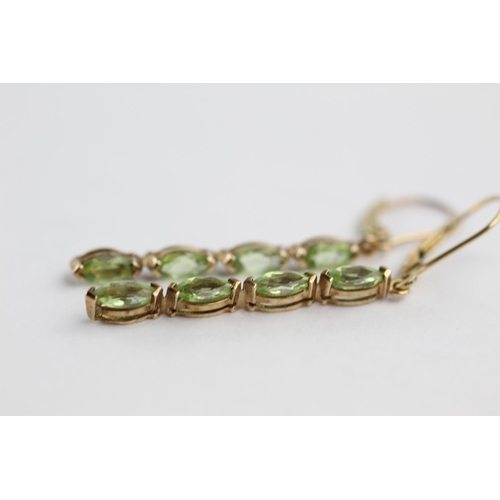 128 - 9ct gold peridot drop earrings (2.2g)