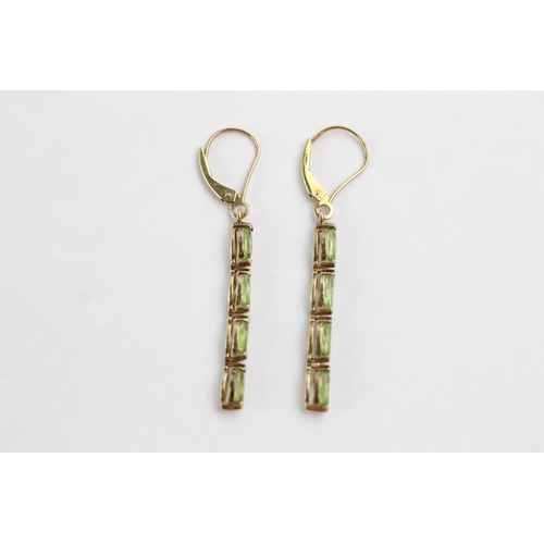 128 - 9ct gold peridot drop earrings (2.2g)