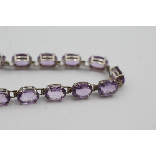 130 - 9ct white gold amethyst tennis bracelet (5g)