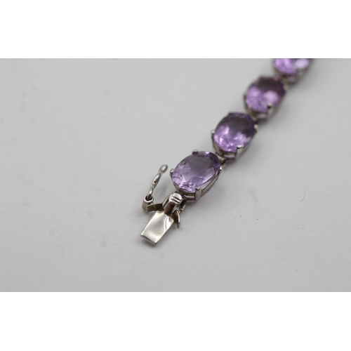 130 - 9ct white gold amethyst tennis bracelet (5g)