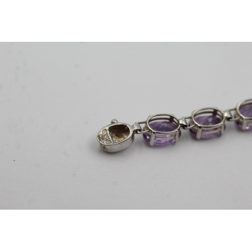 130 - 9ct white gold amethyst tennis bracelet (5g)