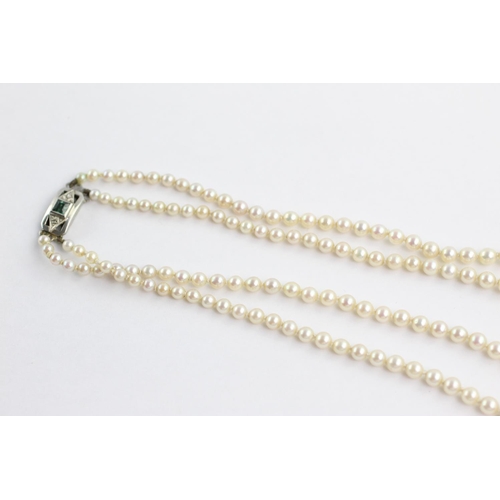 142 - 9ct white gold green gemstone & diamond clasped faux pearl necklace (27.5g)