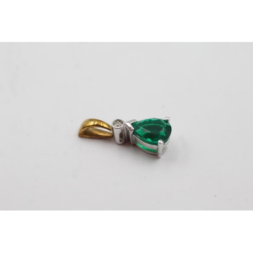 144 - 9ct gold diamond and synthetic emerald pendant (1.1g)