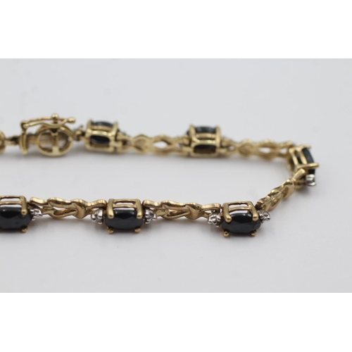 159 - 9ct gold diamond & sapphire panel bracelet (7.7g)