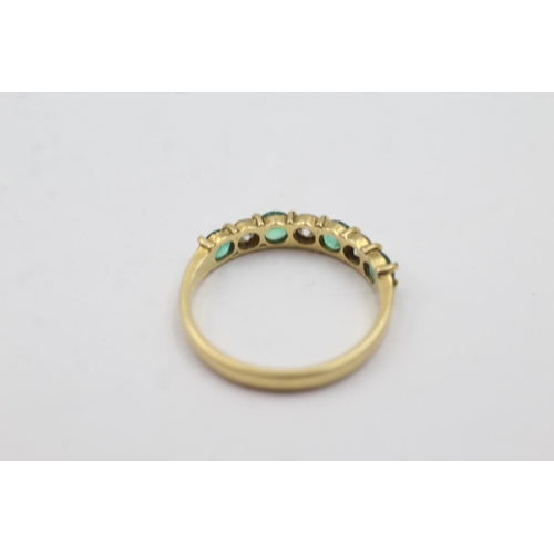 200 - 18ct gold diamond and emerald half eternity ring (2.6g) Size P