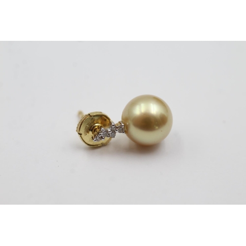 207 - 18ct gold diamond and pearl stud earrings (4.6g)