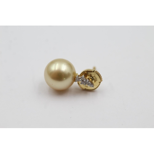 207 - 18ct gold diamond and pearl stud earrings (4.6g)