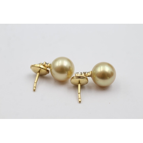 207 - 18ct gold diamond and pearl stud earrings (4.6g)