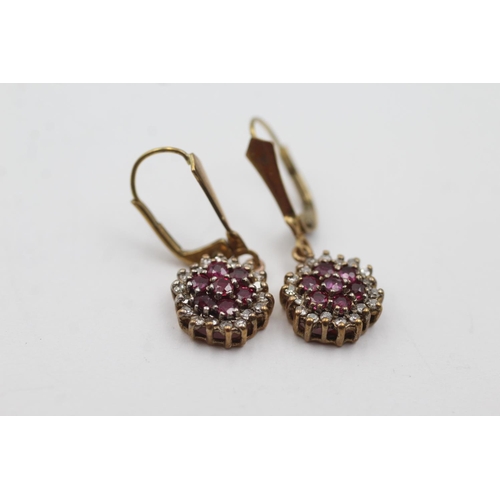 21 - 9ct gold diamond and ruby cluster drop earrings (2.5g)