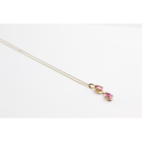 223 - 9ct gold diamond & pink gemstone drop pendant necklace (3.8g)