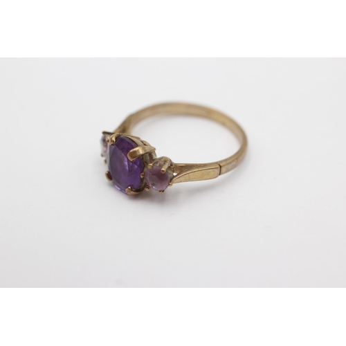 226 - 9ct gold amethyst trio set ring (2.8g) Size O