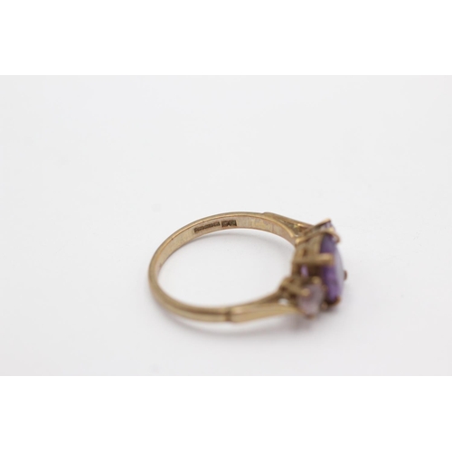 226 - 9ct gold amethyst trio set ring (2.8g) Size O