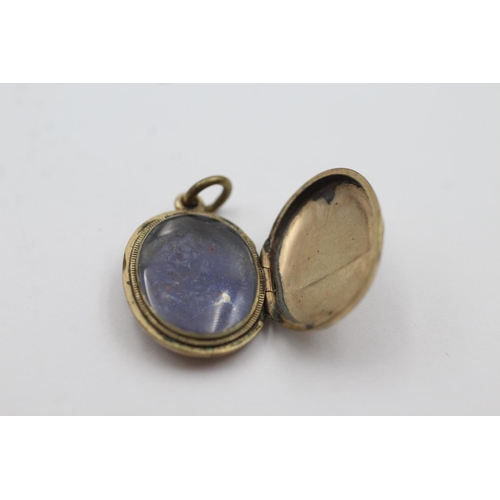 232 - 9ct gold back & front enamel detail locket (3.8g)