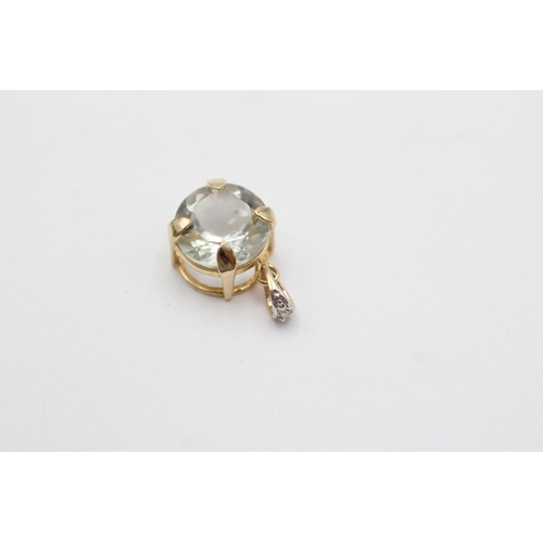 263 - 9ct gold blue quartz pendant (1.5g)