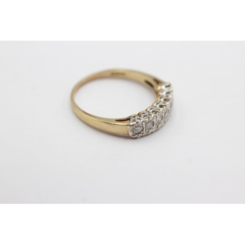 265 - 9ct gold diamond seven stone ring (2.6g) Size T