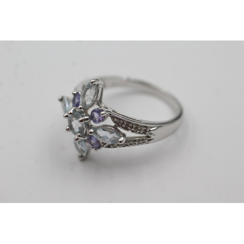 267 - 9ct white gold diamond, tanzanite & aquamarine ring (4.2g) Size R