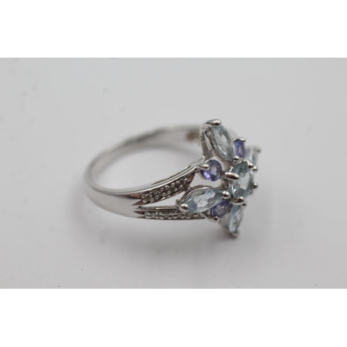 267 - 9ct white gold diamond, tanzanite & aquamarine ring (4.2g) Size R