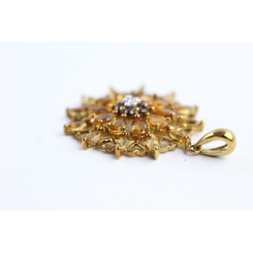 270 - 9ct gold garnet, diamond & citrine floral pendant (3.7g)