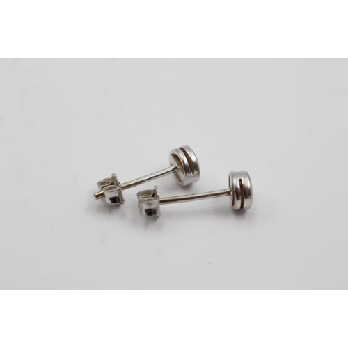 287 - 18ct white gold diamond stud earrings (1.4g)