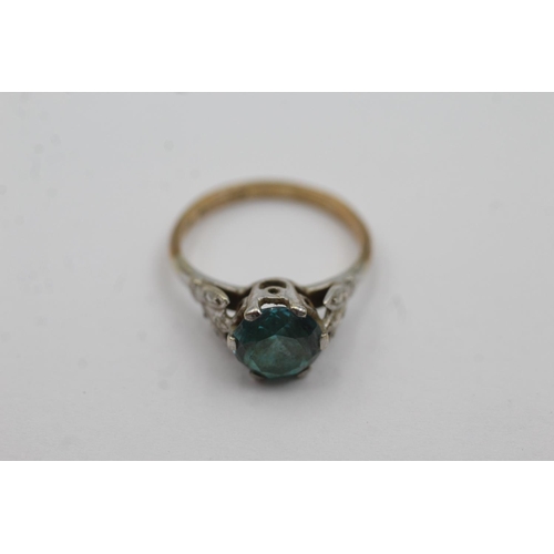 288 - 9ct gold blue zircon solitaire ring (2.4g) Size J