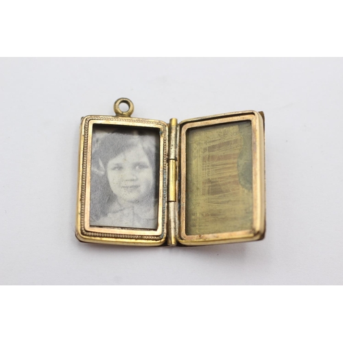 295 - 7ct gold antique book locket pendant (6.1g)