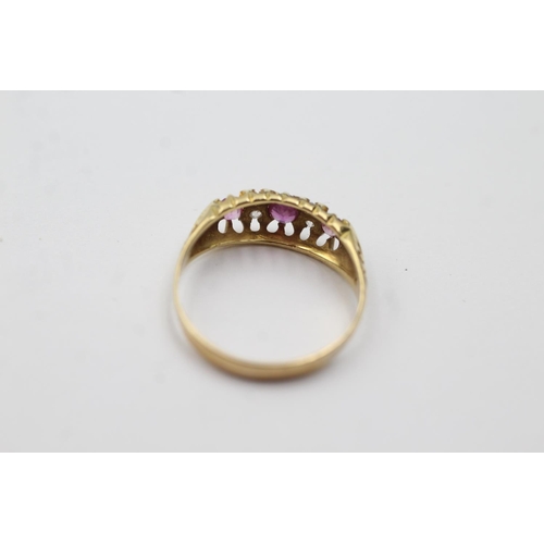 299 - 9ct gold diamond and ruby ring (2g) Size N