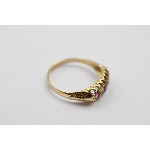 299 - 9ct gold diamond and ruby ring (2g) Size N