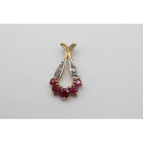 35 - 9ct gold ruby & diamond pendant (1.1g)