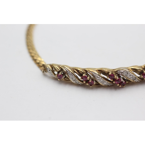 39 - 9ct gold ruby & diamond detail bracelet (5.8g)