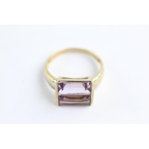 40 - 9ct gold amethyst fronted ring (3g) Size N