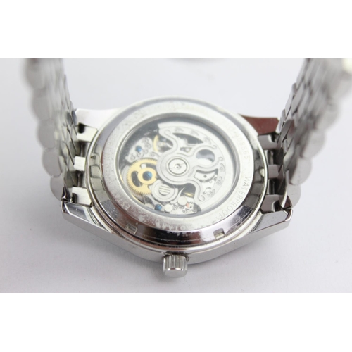 407 - Rotary Skeleton movement gent's mechanical wristwatch automatic Working - box and papers and 3x spar... 