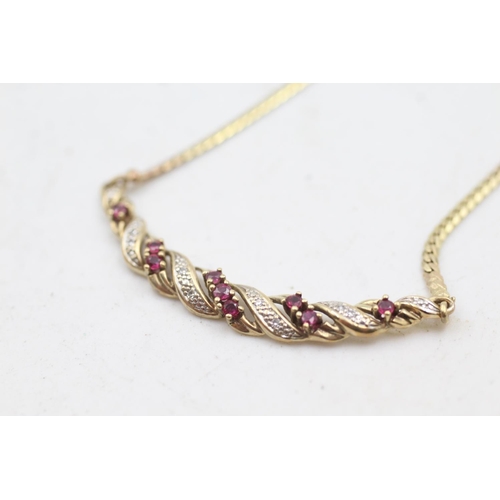 44 - 9ct gold ruby & diamond static pendant necklace (6.3g)