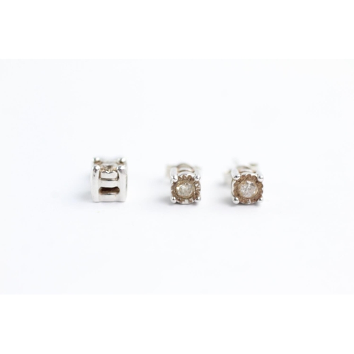 45 - 2 x 9ct white gold diamond pendant and stud earrings set (1.8g)