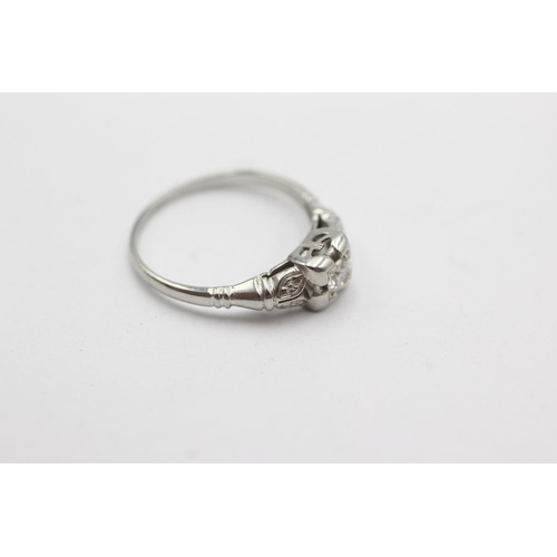 49 - 18ct white gold diamond ring (1.8g) Size K