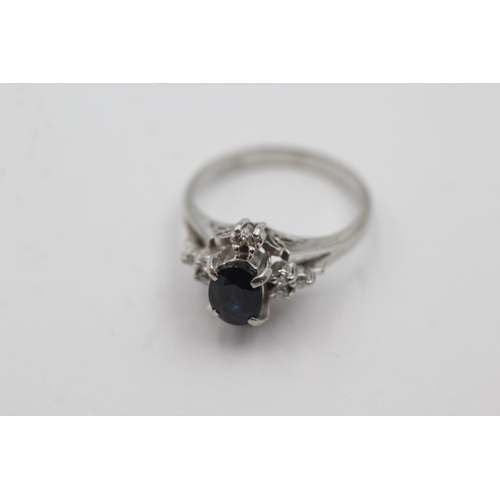 53 - .900 platinum diamond and sapphire ring (4.8g) Size L