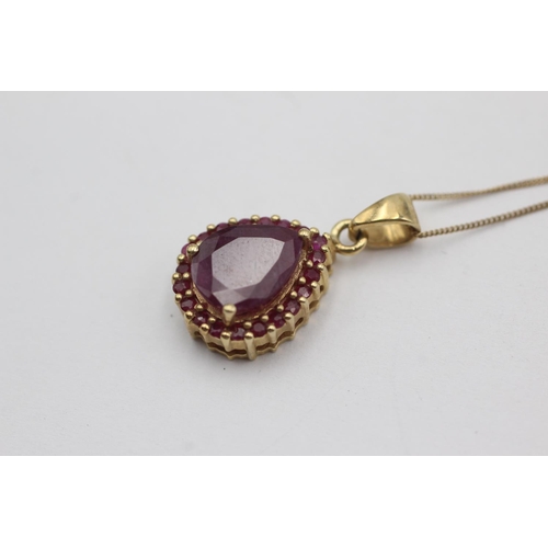 56 - 9ct gold ruby pendant necklace (2.8g)