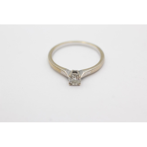 59 - 9ct gold diamond solitaire ring (1.6g) Size N