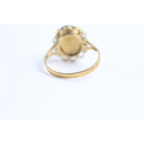 62 - 9ct gold rope framed citrine ring (2.4g) Size L